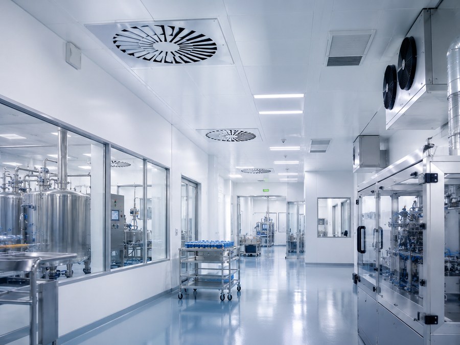 Clean temperature-controlled processing area with air handling and controlled-room infrastructure